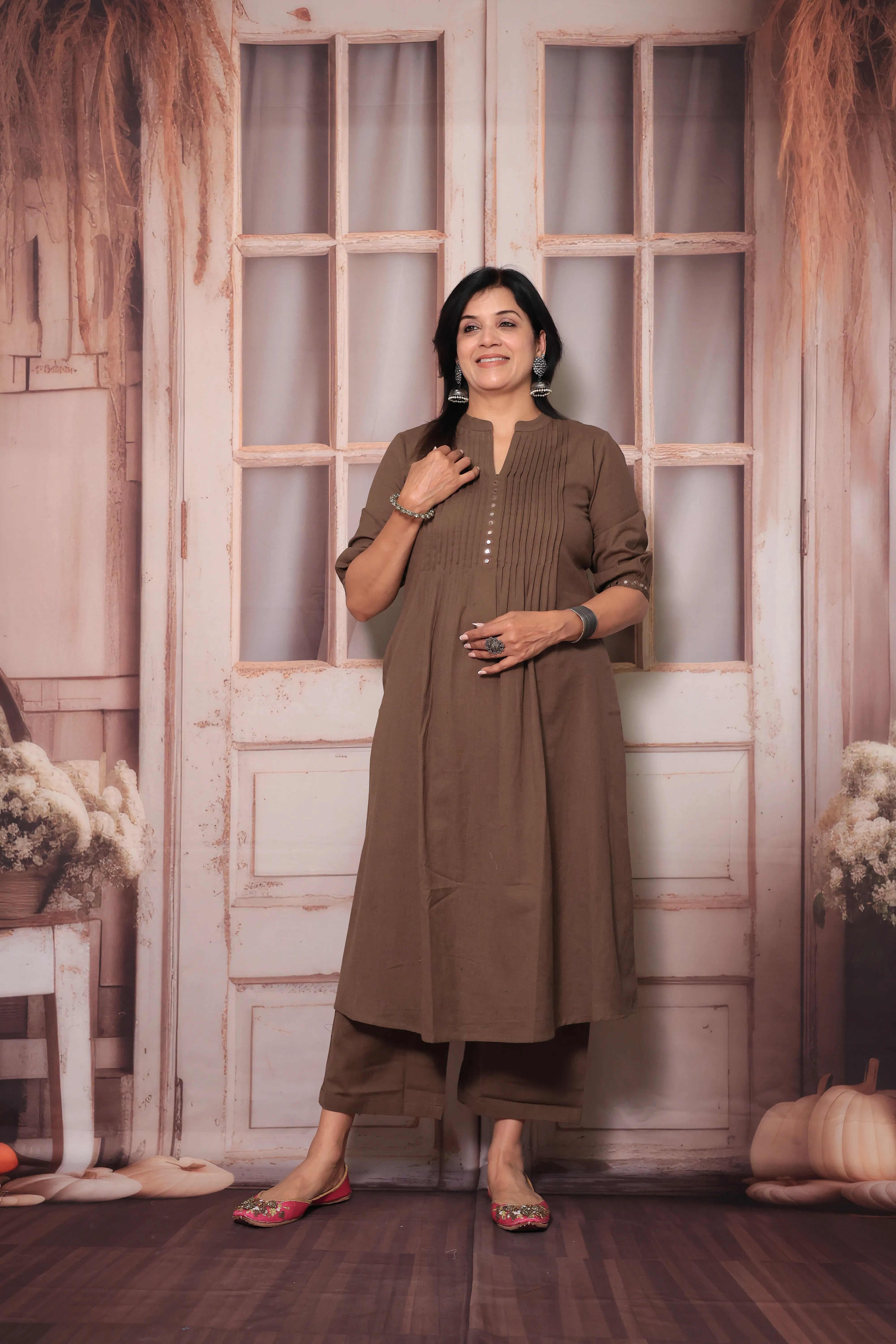 Brown A-Line Pleated Yoke Kurti Pant Set in Flex Cotton with Mirror Work for Women