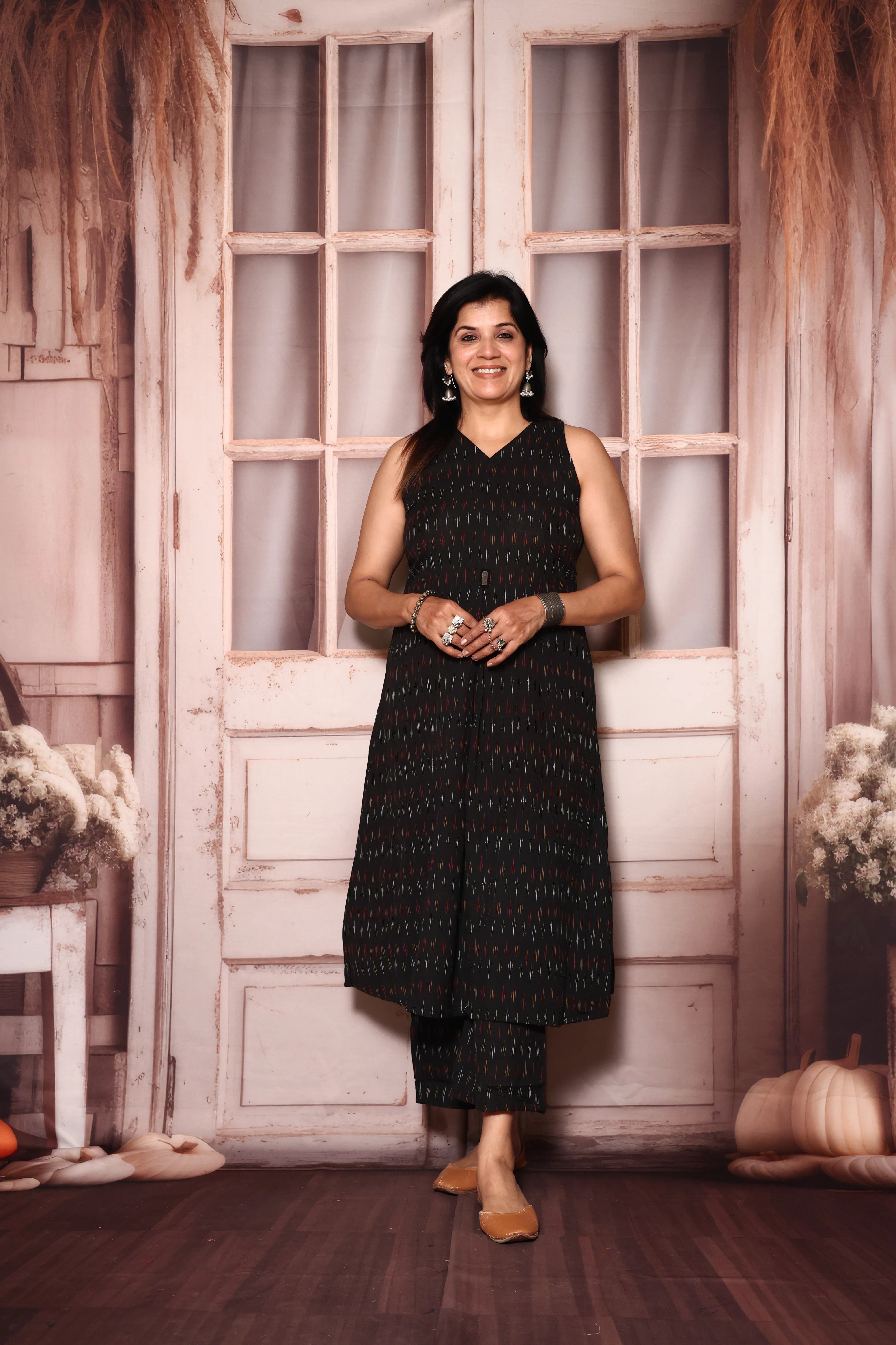 Black A-Line Sleeveless Ikkat Print Kurta Pant Set | Attached Sleeves