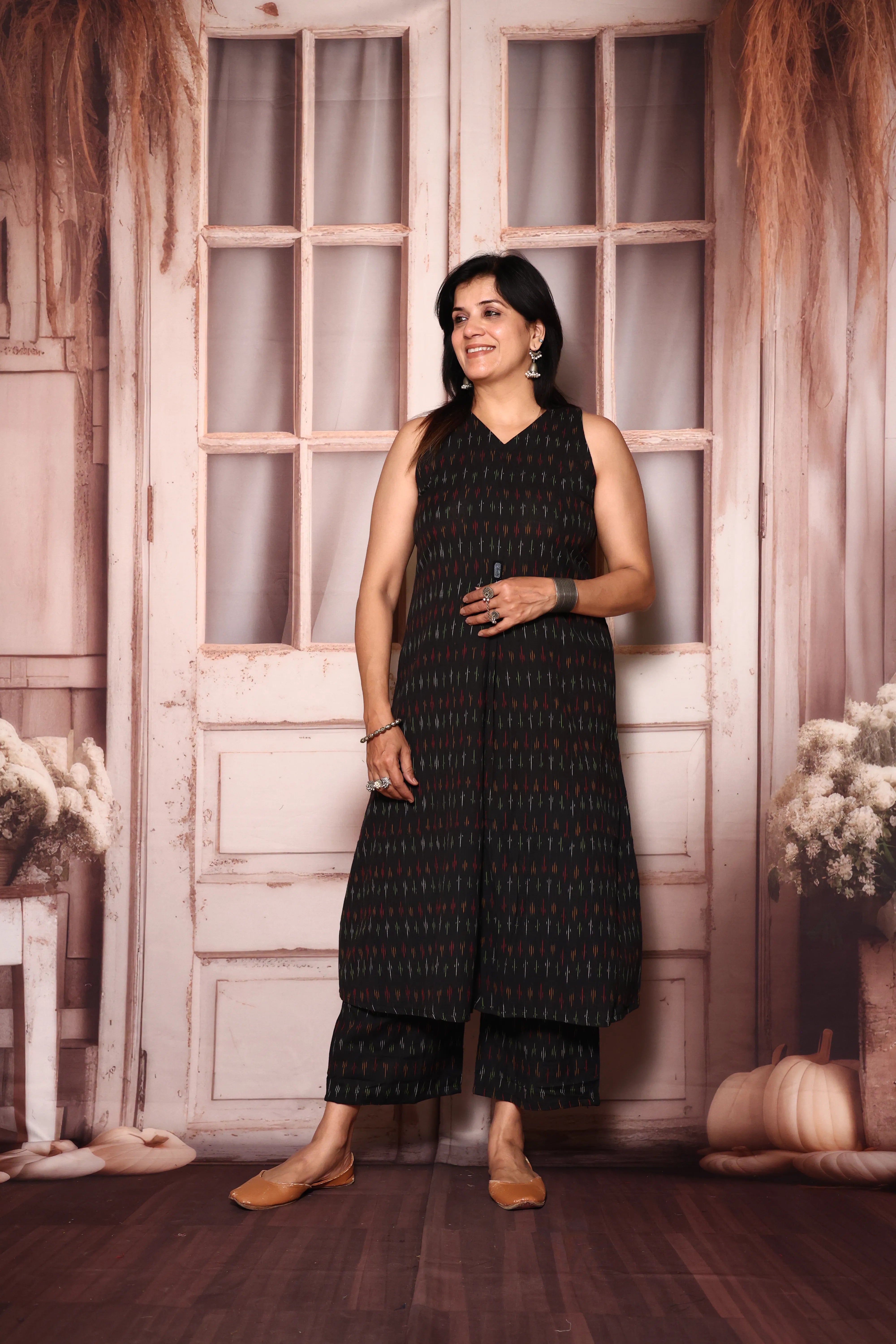 Black A-Line Sleeveless Ikkat Print Kurta Pant Set | Attached Sleeves