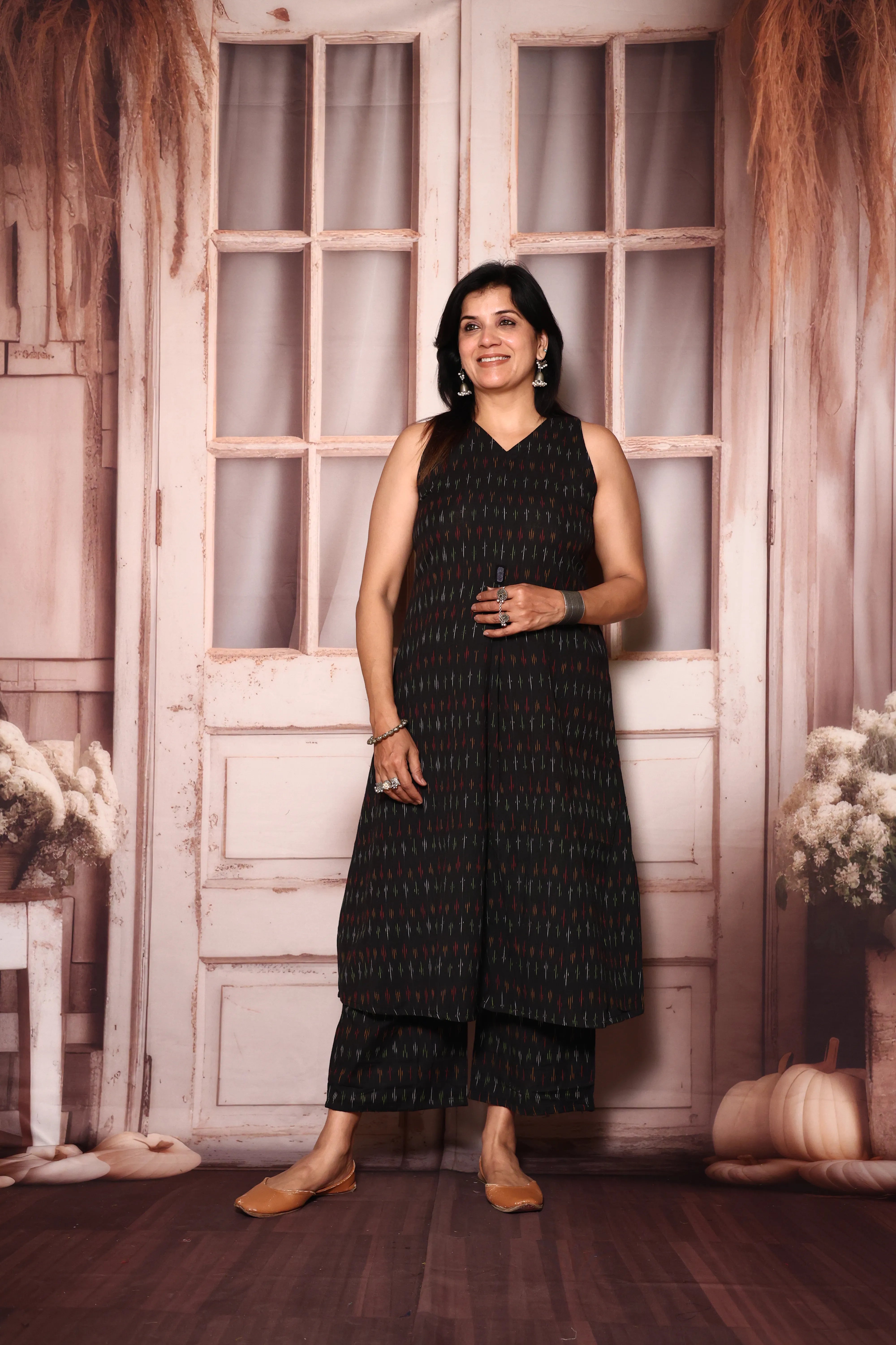 Black A-Line Sleeveless Ikkat Print Kurta Pant Set | Attached Sleeves