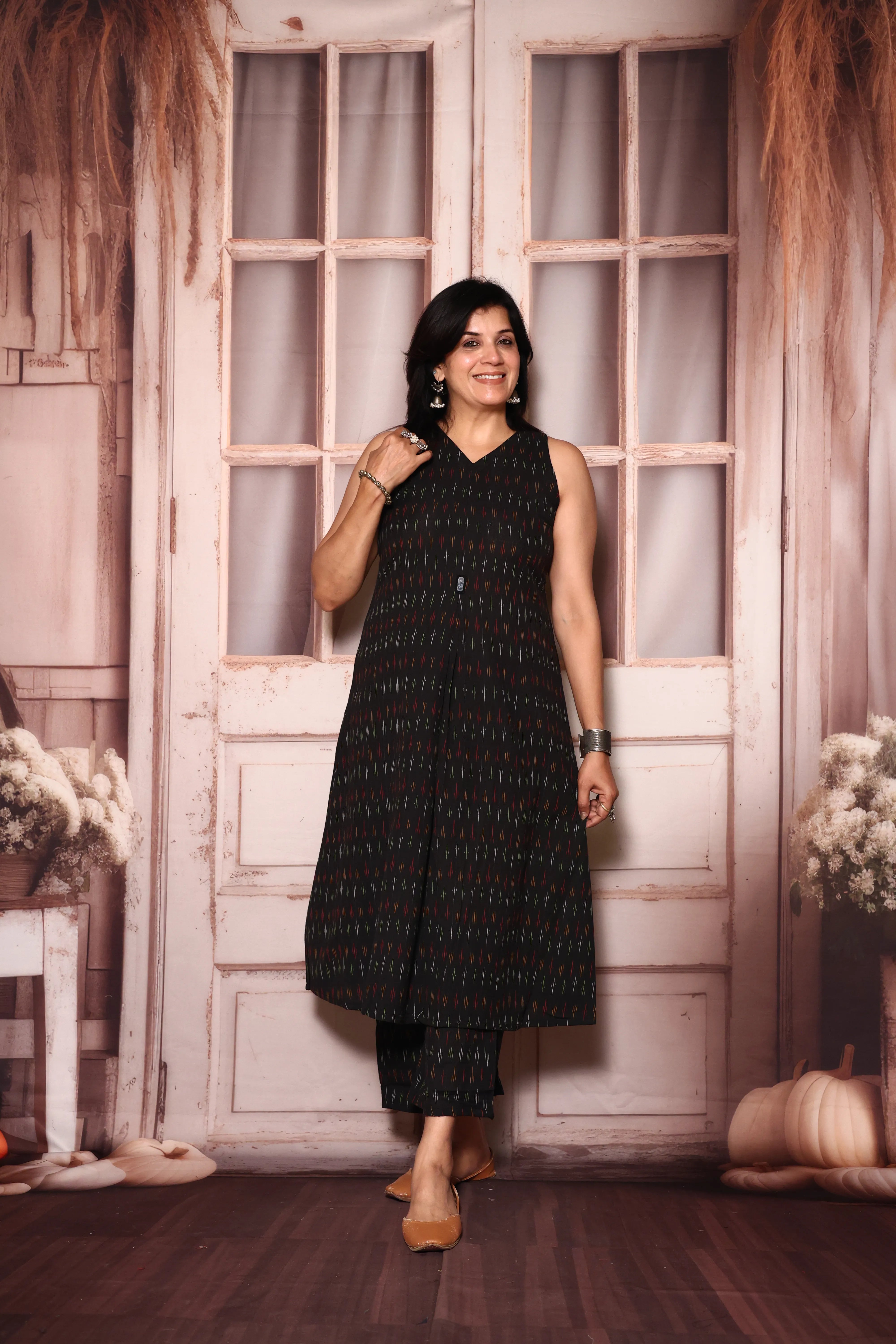 Black A-Line Sleeveless Ikkat Print Kurta Pant Set | Attached Sleeves