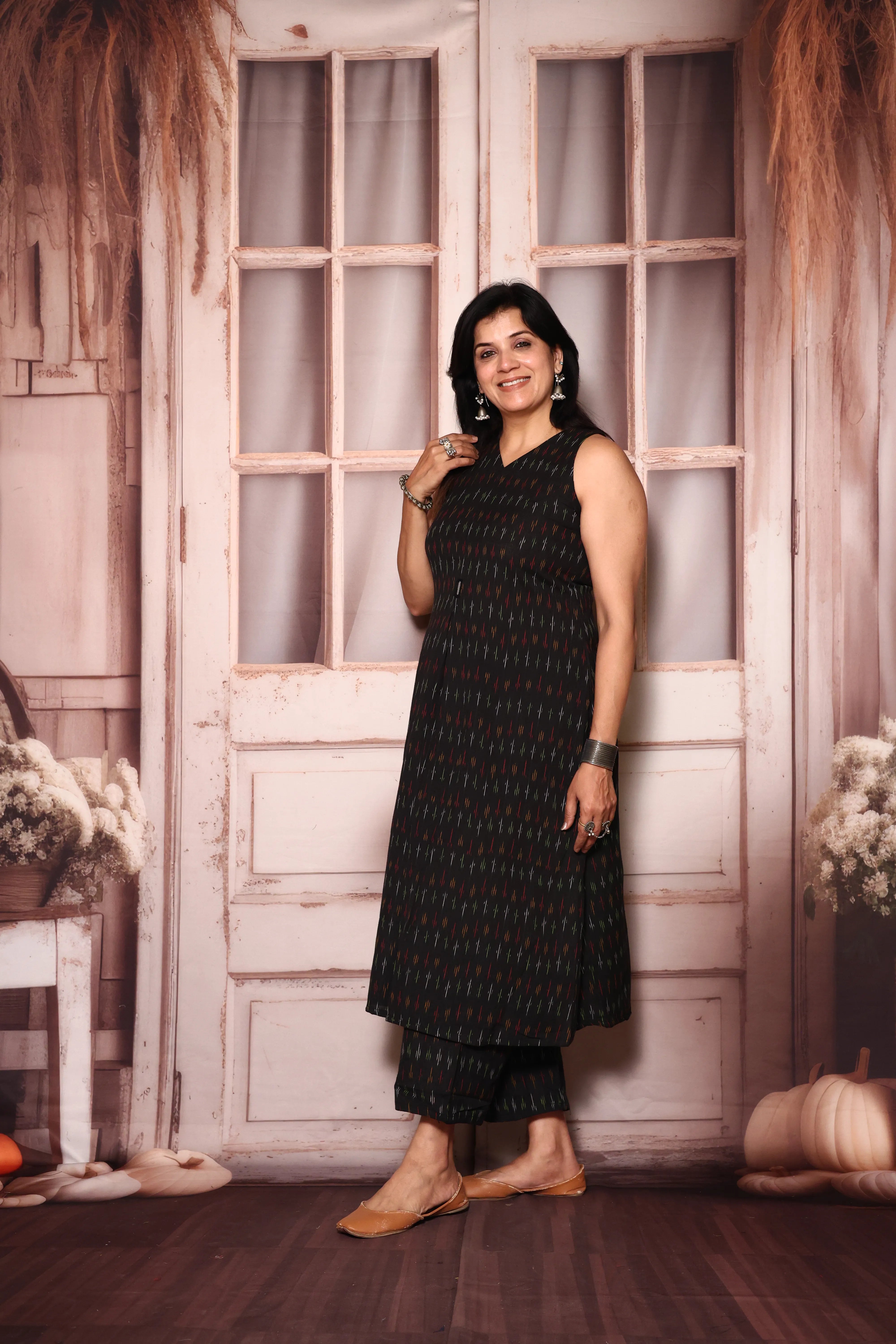 Black A-Line Sleeveless Ikkat Print Kurta Pant Set | Attached Sleeves