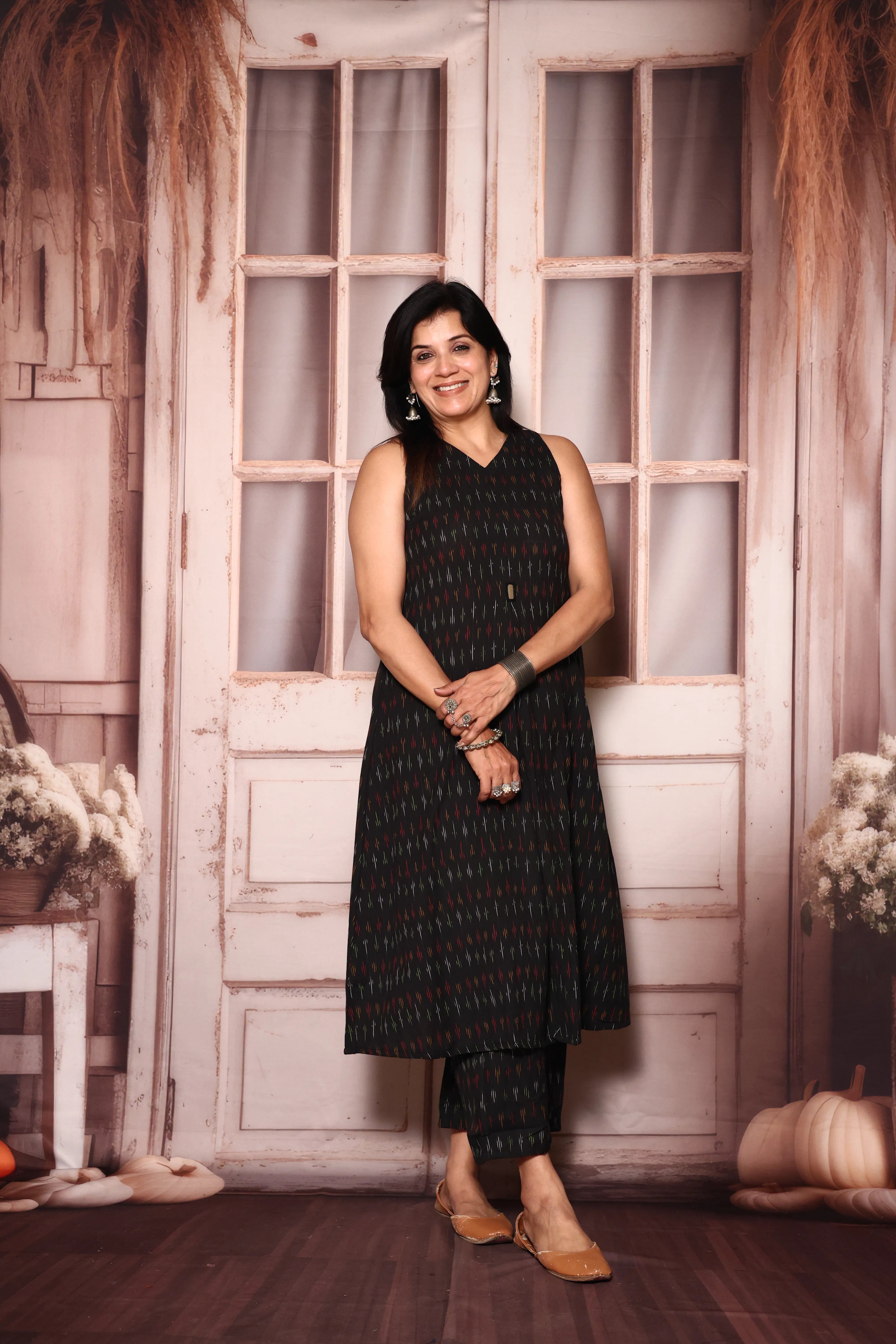 Black A-Line Sleeveless Ikkat Print Kurta Pant Set | Attached Sleeves